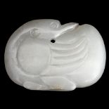 A Chinese carved jade pendant in the form of a swan,