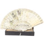 A late 19th Century parchment fan, gilt wooden sticks,