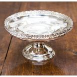 A George V silver pedestal bowl with pierced gallery and circular base, hallmark London 1923,