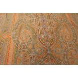 A large woven throw/table cloth in fine wool, paisley pattern in orange, reds,