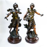 A pair of spelter cast figures,