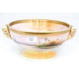 An early 20th Century Noritake fruit bowl with Egyptian scenes and heavy gilding