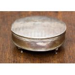 A Birmingham silver ladies raised oval jewel box with velvet lining S and Co 1924 with engine