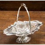 An Edward VII Art Nouveau silver pedestal basket of shaped oval form,