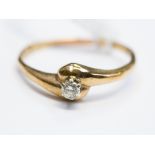 A diamond solitaire 9ct gold ring, small round cut diamond, 1.