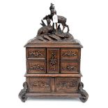 A Black Forest carved wood sewing box (1)