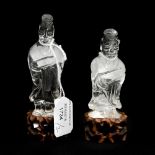 A pair of Chinese carved rock crystal figures of officials,