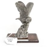 A small pewter casting of a Barn Owl by A.B.