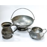 A pewter twin handled bowl and a pewter tankard;