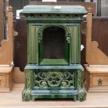 A 1920s ceramic garden log burner,