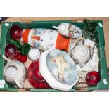 A box containing a collection of items, including a set of red wine glasses, Japanese ceramics,