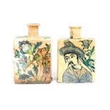 A pair of Persian pottery bottles, possibly Qajar pottery, tin glazed with birds,