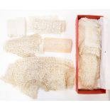 A box of lace comprising Victorian hand made lace, a Victorian collar, lace and net sleeves, etc,