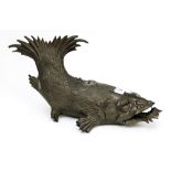 A bronzed model of a cat fish, possibly later filled, missing top piece,