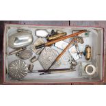 A box containing a collection of assorted silver trinkets, including boxes, compact, thimbles,