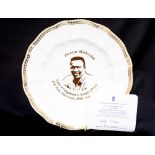 A Royal Crown Derby 'Devon Malcolm' cabinet plate, by Hugh Gibson, Ltd edition lot of 200,