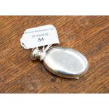 A silver oval pocket scent bottle, screw top, maker A.J.