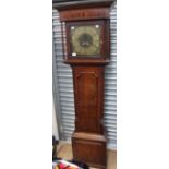 An 18th Century country oak longcase clock with square brass dial