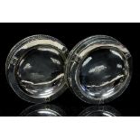 A E Jones, a pair of Arts and Crafts silver pin or bon bon dishes, circular,