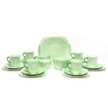 A Shelley Art Deco tea set, green dot design, pattern 12970, on Dainty shape, including six cups,