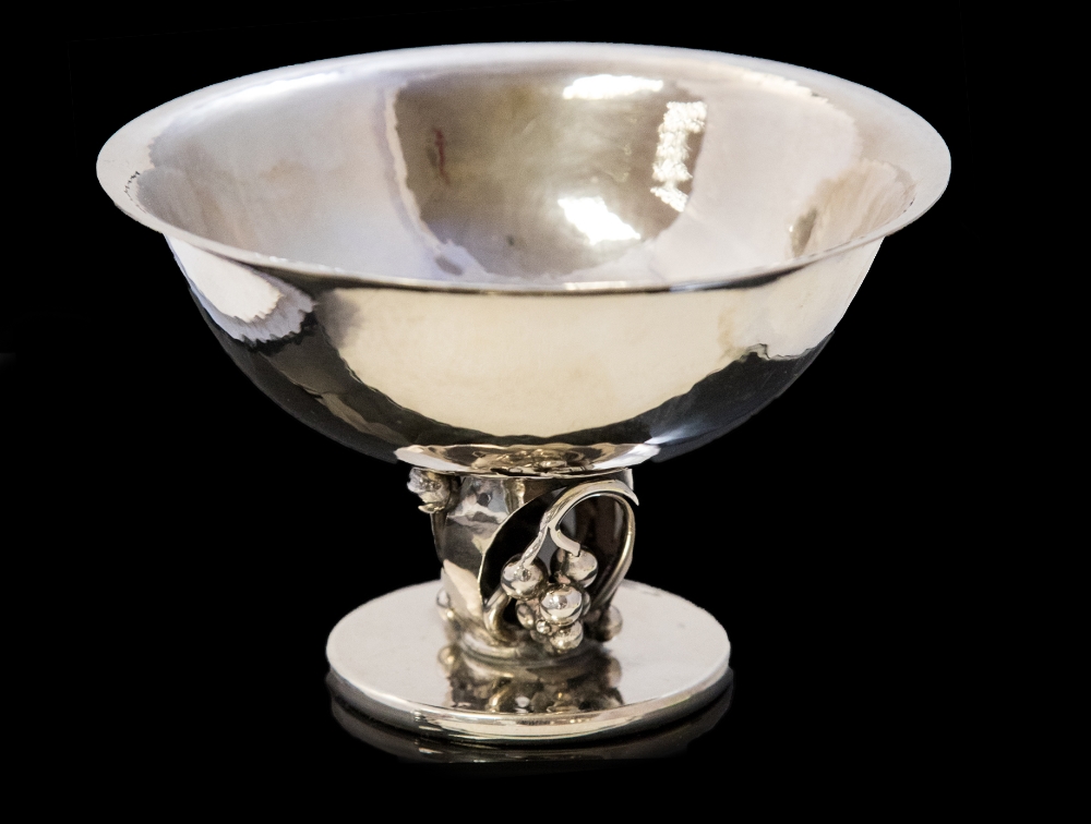 A Danish silver pedestal bowl, Danks Guldsmede Handvaerk, hand hammered bowl with everted rim,