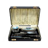 An Art Deco silver and enamel manicure set, blue,