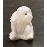 Bernard Moore (attributed), a blanc de Chine figure of a monkey,