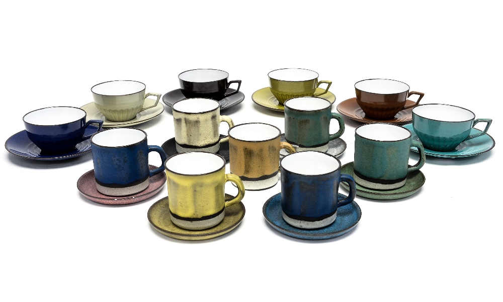 A set of six Studio pottery Harlequin coffee cans and saucers,