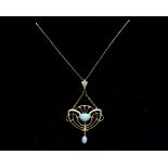 Barnet Henry Joseph, an Arts and Crafts 9 carat gold and opal pendant on chain,