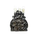 An Art Nouveau white metal perfume holder.