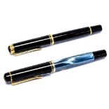 A Pelikan M200 fountain pen, black resin with gold trim, 18 carat gold broad nib,
