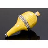 An early 20th century yellow guilloche enamelled bell pull,