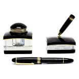 A Montblanc Meisterstuck 146 Le Grand fountain pen, black with gold plated mounts,