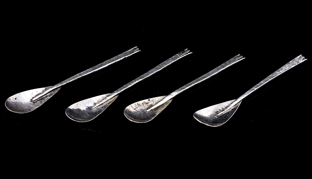 Enid Kelsey, a set of four Arts and Crafts silver condiment or coffee spoons,