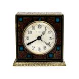 A Secessionist Zenith enamelled brass alarm clock,