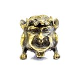 An Aesthetic Movement gilt brass grotesque novelty inkwell, in the form of a face,