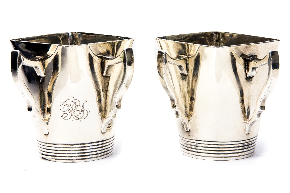 A pair of Arts and Crafts silver cups, of square conical form,