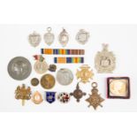 A bag of badges, medallions, World War One 1914-18 Star to PTE.T.MC'ARA SS-1955-7 A.S.C.