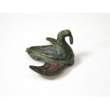 A Romano-British bronze brooch in the form of a duck in flight with wings outstretched.