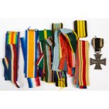 Germany World War I Iron Cross 2nd Class with a bag of medal ribbons various 19th/20th Century and