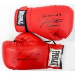 Boxing Memorabilia: A pair of signed boxing gloves, one signed by Lennox Lewis,