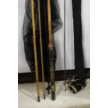 A spilt cane fishing rod with a balance scale