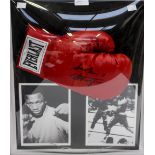 Boxing Memorabilia: A signed and cased, 'Smokin' Joe Frazier' boxing glove, 'Rumble in the Jungle',