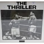 Boxing Memorabilia: A signed photograph of Mohammed Ali and Joe Frazier, framed,