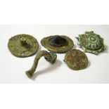 Five Bronze Roman Brooches 2nd-3rd Century AD Glass centre-boss brooch with gilding and conical