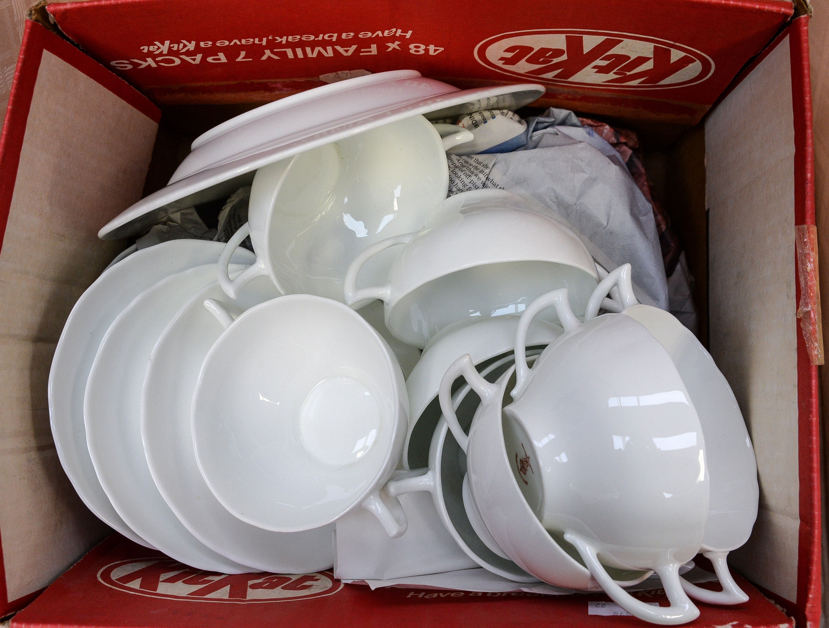 A collection of Royal Crown Derby white porcelain, soup bowls,