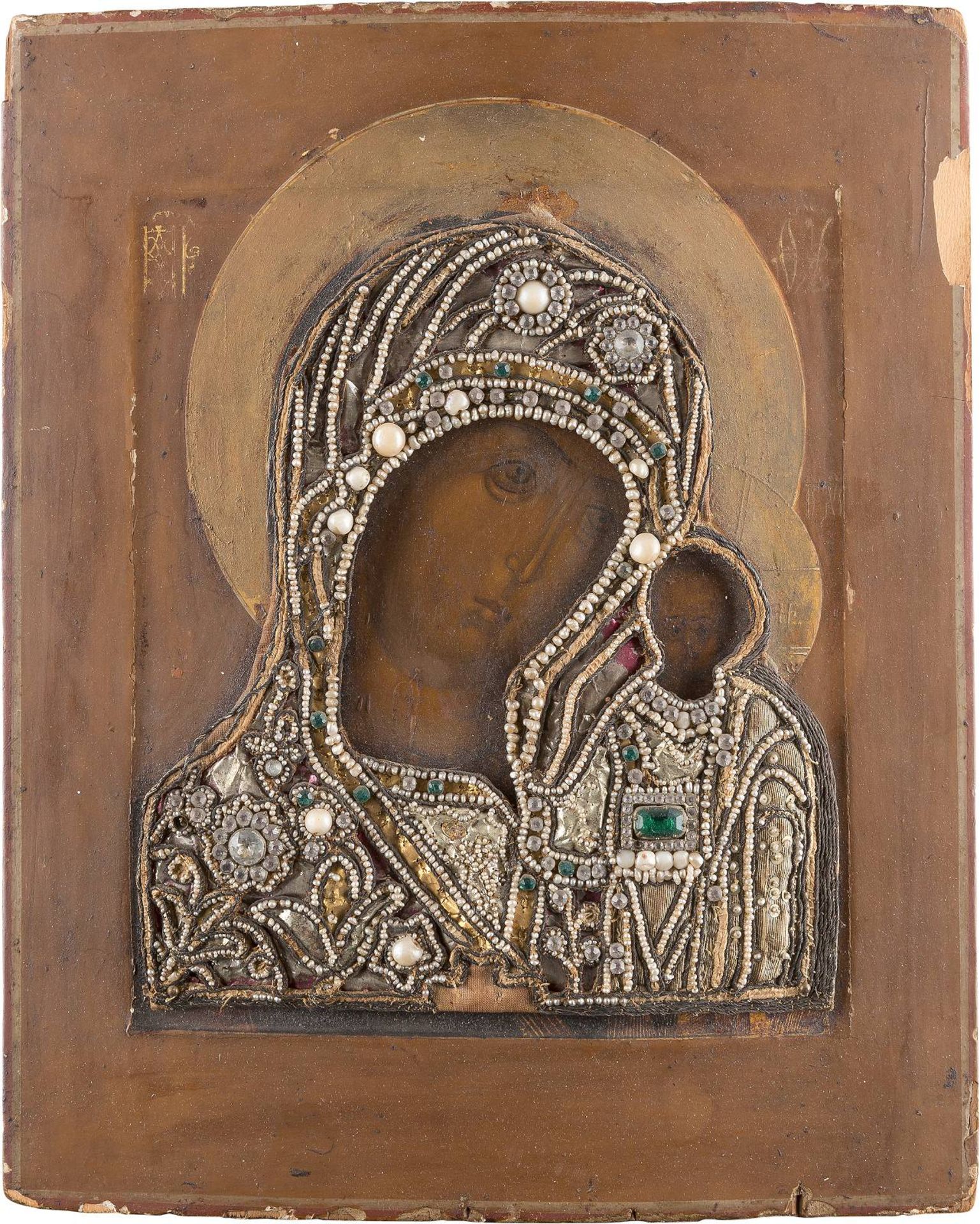 AN ICON SHOWING THE KAZANSKAYA MOTHER OF GOD WITH EMBROIDERYRussian, circa 1800 Tempera on wood