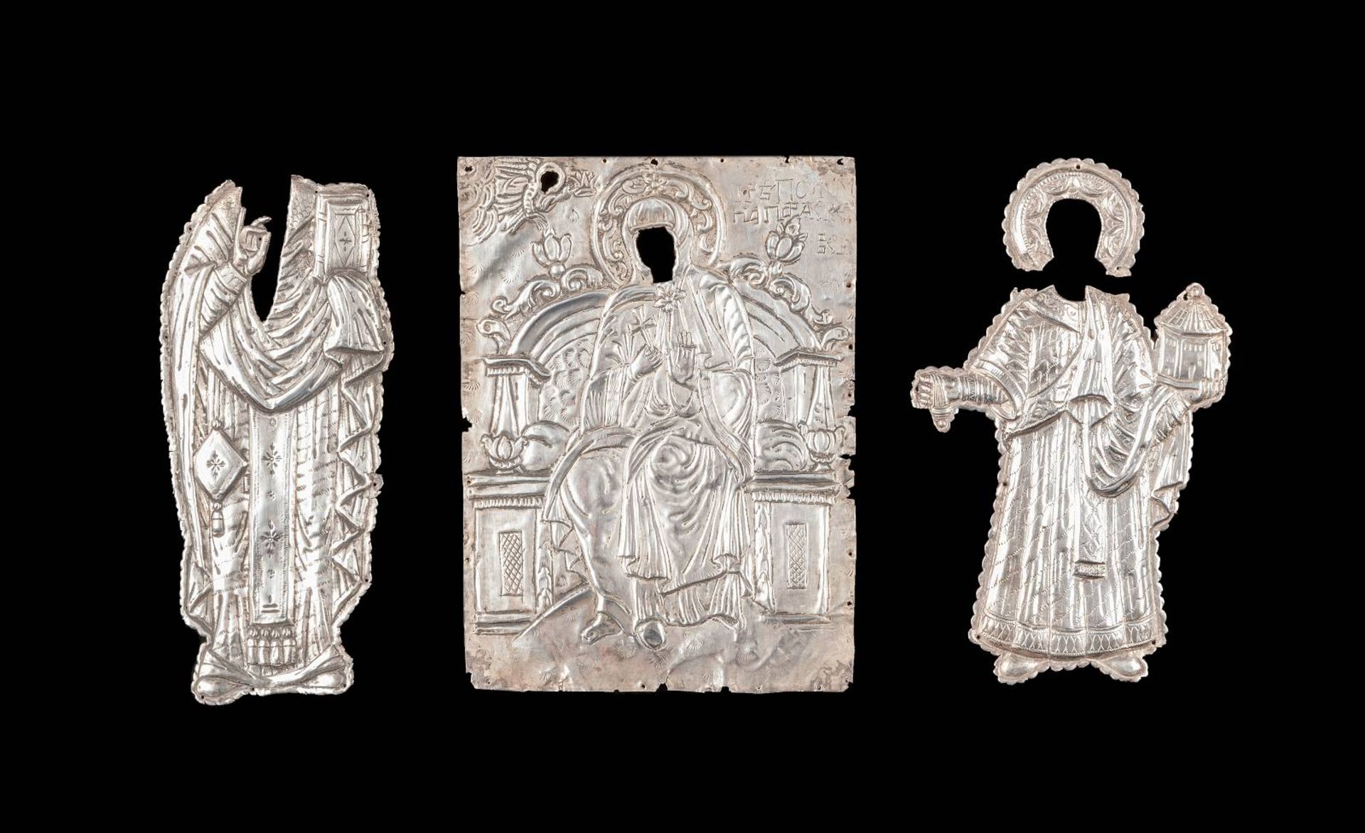 THREE SILVER PLAQUES SHOWING THE MOTHER OF GOD AND SAINTSRussian/Greek, 19th century Silver, chased,