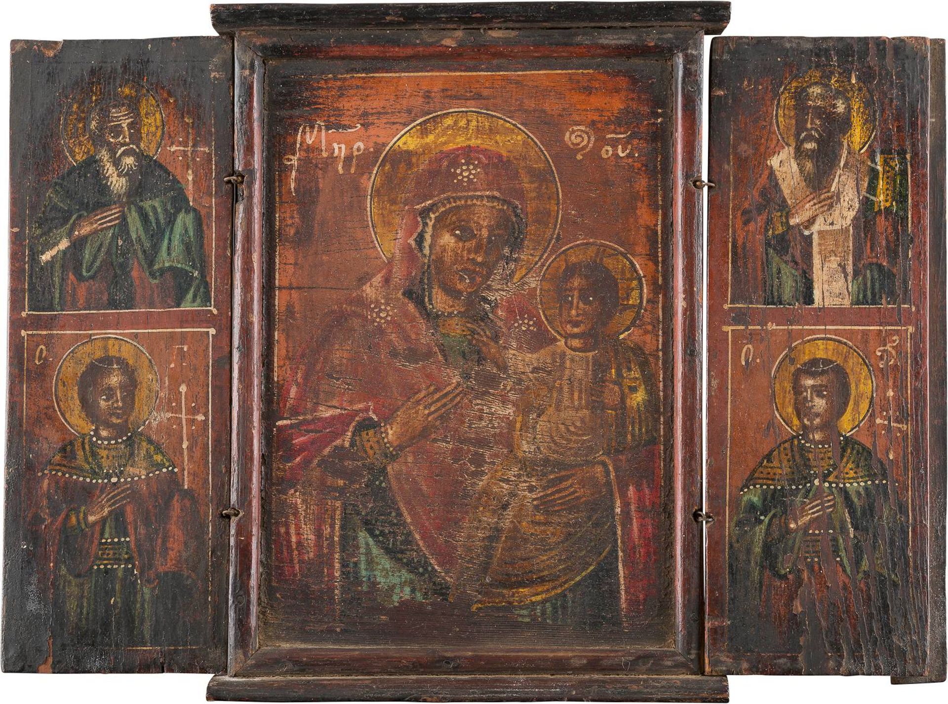 A TRIPTYCH SHOWING THE MOTHER OF GOD AND FOUR SAINTSBalkan, 19th century Oil on wood panel.