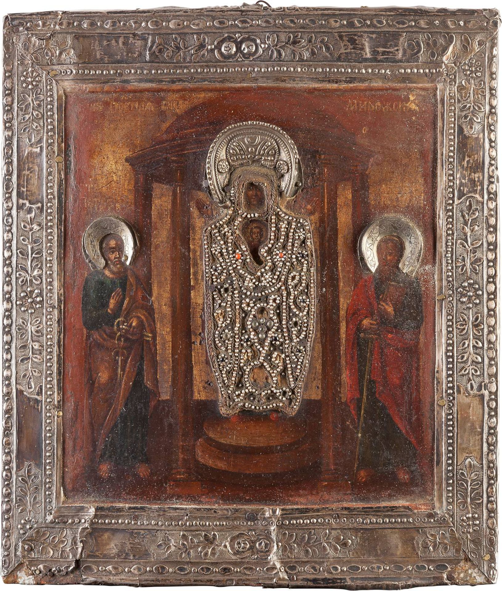 A RARE ICON SHOWING THE MIROZHKAYA MOTHER OF GOD WITH SILVER BASMARussian, late 18th century (icon),